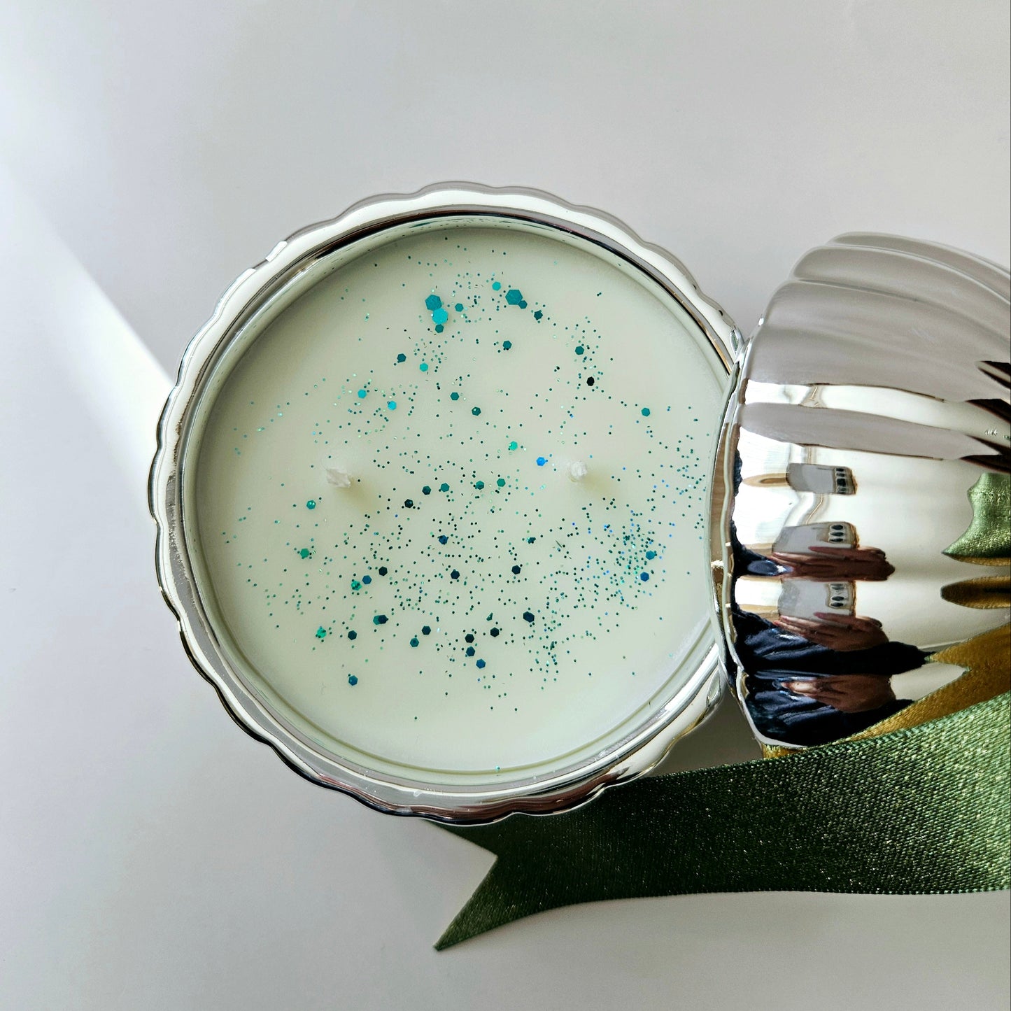 Silver Christmas bauble candle with glitter in wax